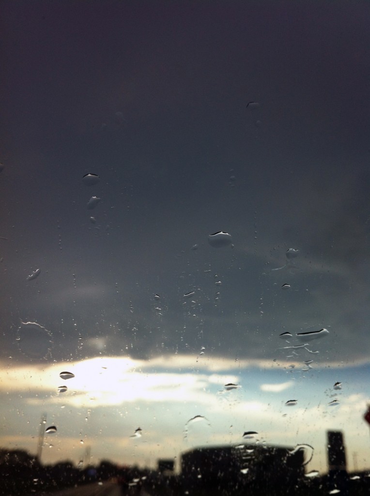 Rainy Sunshine © 2012 - digital photograph iPhone photo rain on windshield with clouds and sun